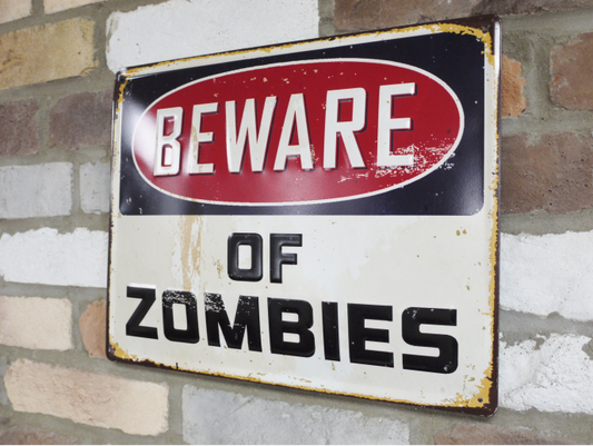 Zombies metal sign